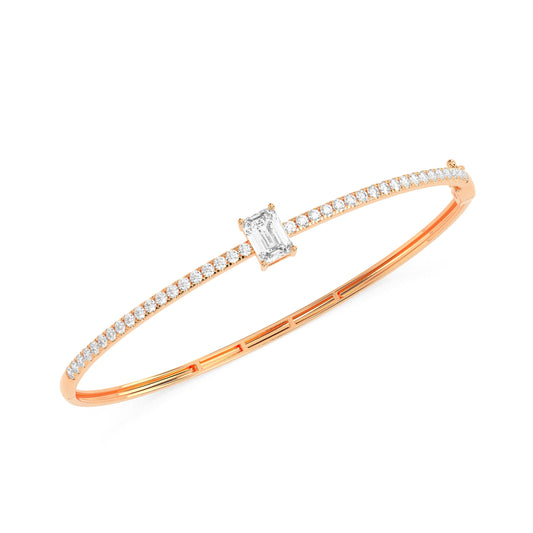 Luxury emerald diamond bangle with sparkling round diamonds
